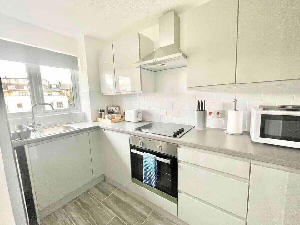 Equipped kitchen and plenty appliances! Enjoy preparing meals in the  lovely kitchen. 