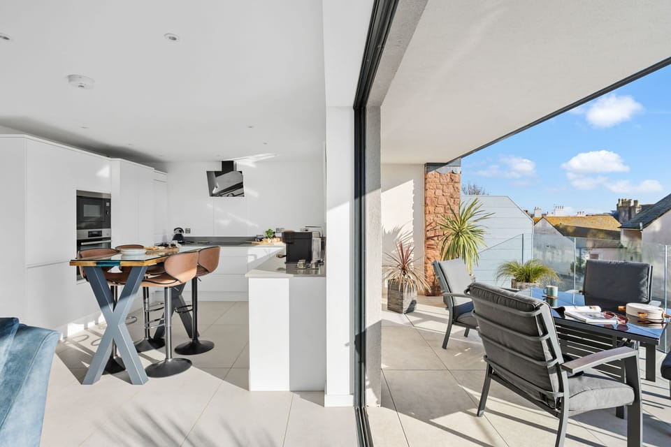 The kitchen, dining room and outside area - Estuary View