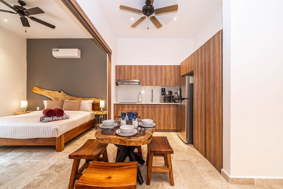 Gather around the cozy dining table, perfect for enjoying meals or planning your adventures.