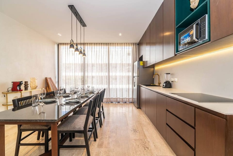Cook, dine, and relax in this bright and inviting kitchen and dining space