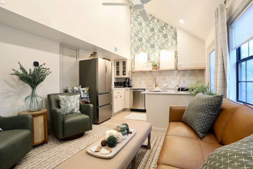 Gather in the open-concept kitchen and living room