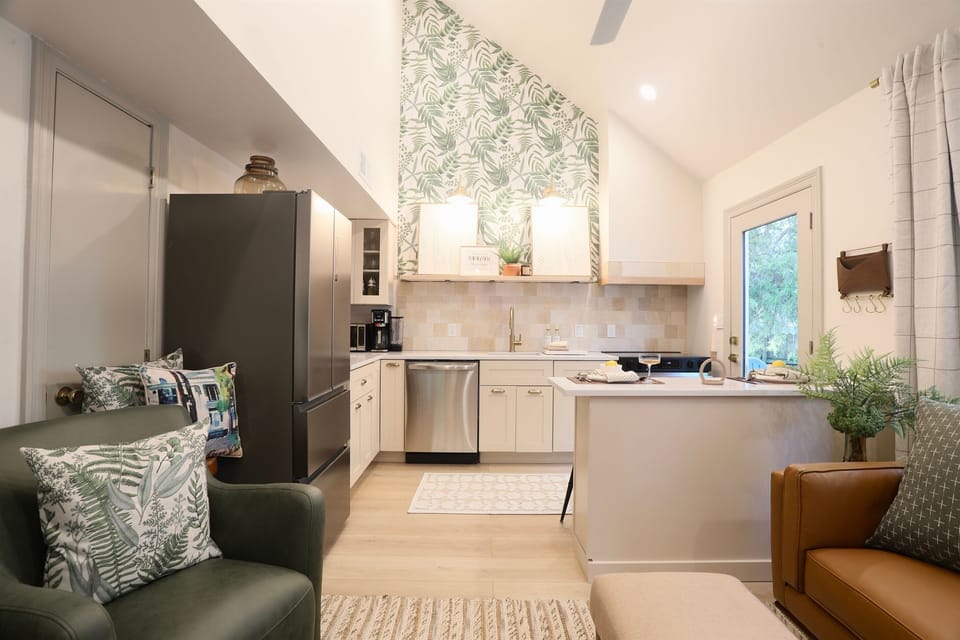 Gather in the open-concept kitchen and living room