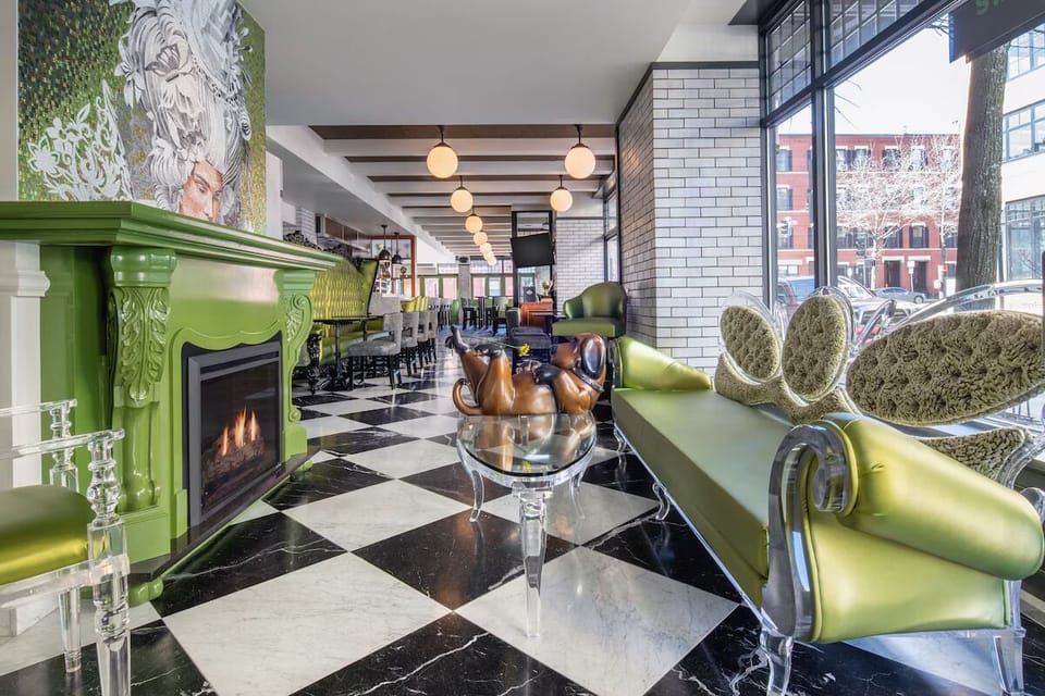 Unwind by the fireplace in a chic, sunlit lounge