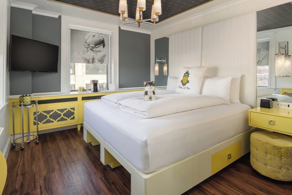 Sink into a cloud-soft bed in a bold, modern retreat.