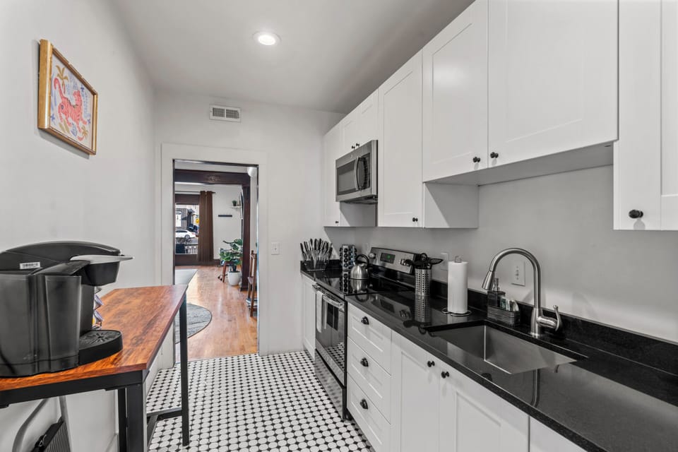 Kitchen with a view into the main living space. 