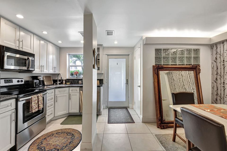 Cook, dine, and connect in this beautifully designed kitchen and dining space.