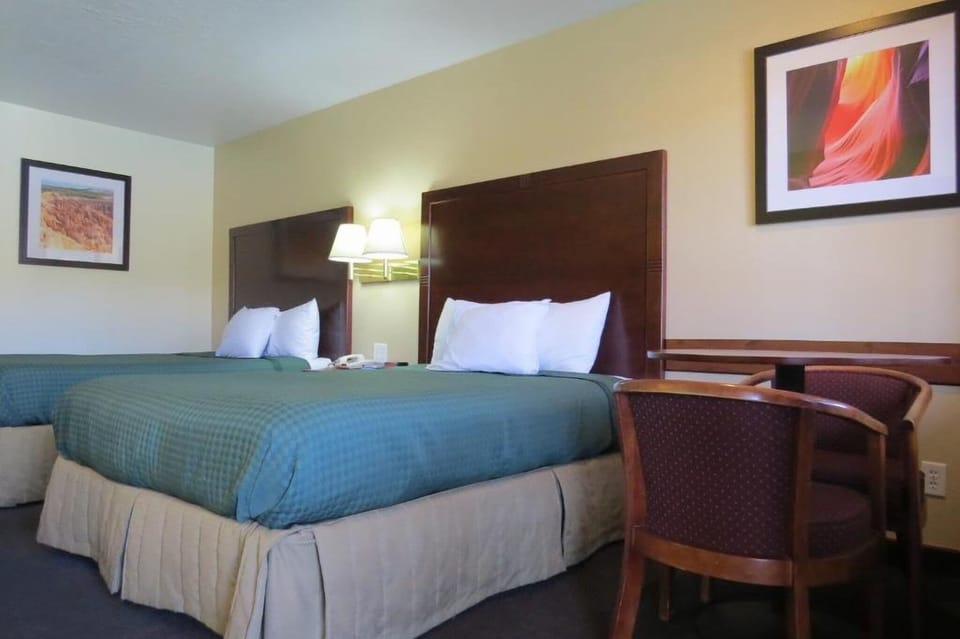 Unit with 2 Queen beds. Exact unit will be assigned upon arrival. Views, colors, and decor may vary.