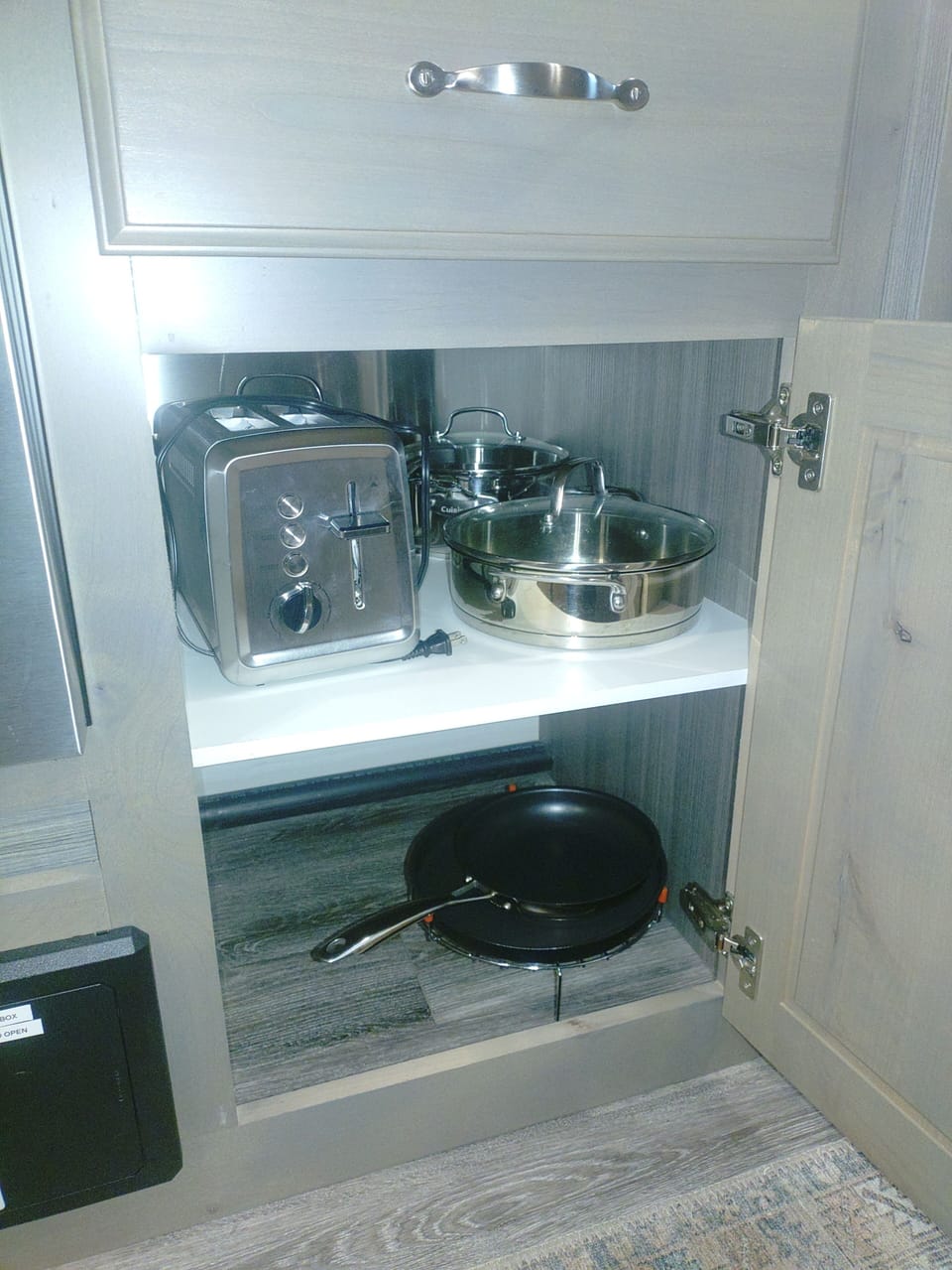 Pots, pans and toaster.
