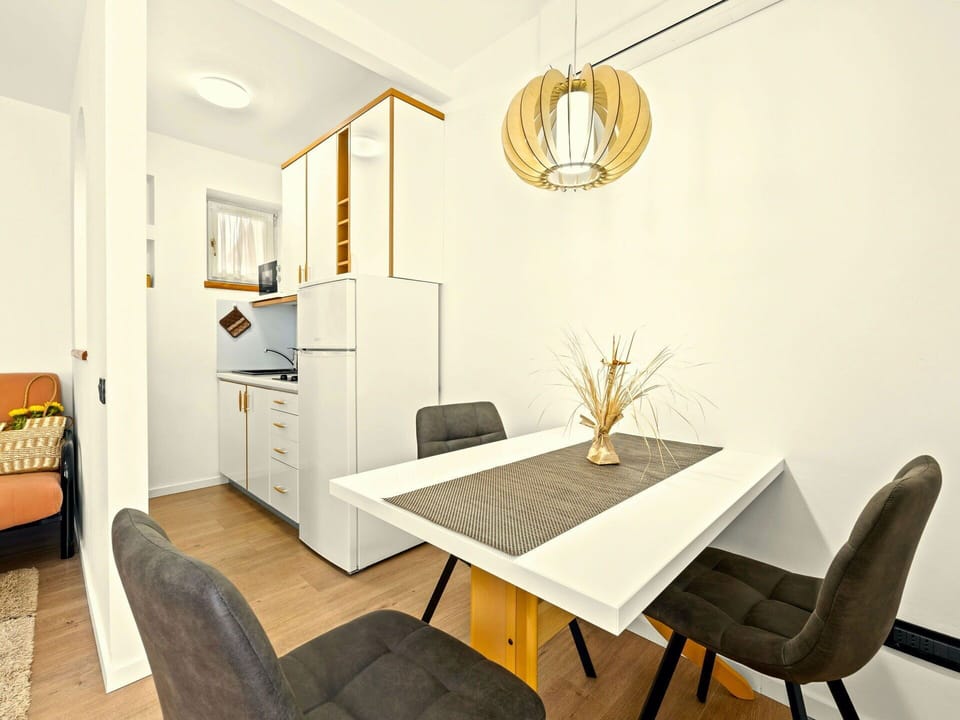 Furniture, Interior Design, Flooring, Floor, Wall, Wood, Room, Table, Ceiling, Lighting