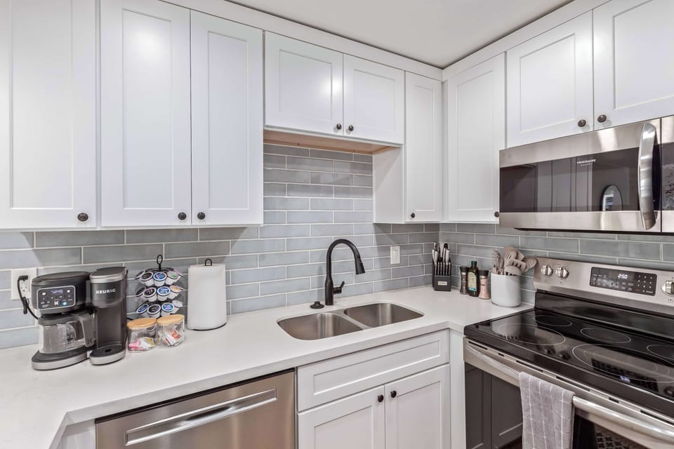 Full stocked kitchen with stainless steel appliances