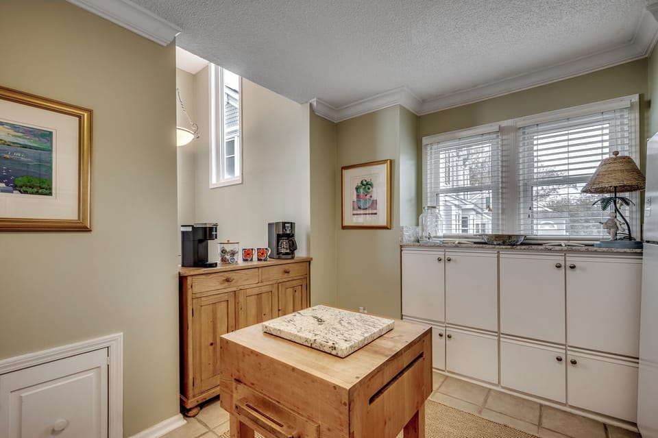 Start your day right with a view of the butcher block, while the hutch in the background keeps your coffee service just a step away from perfection.