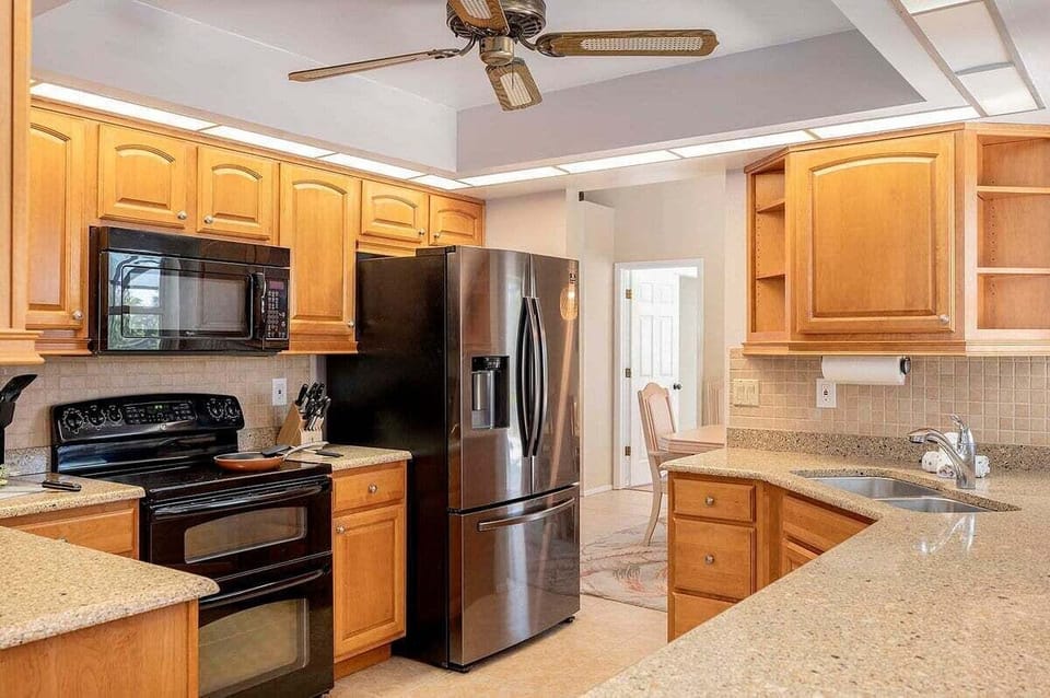 Kitchen with Double Oven and Stainless French Door Fridge