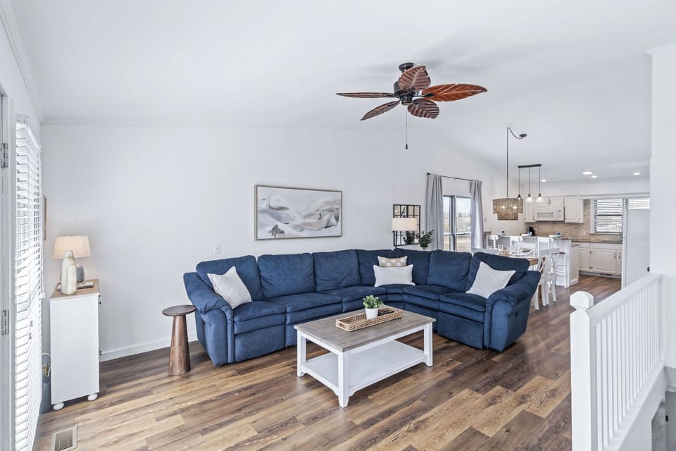 Living Room - Perfect for unwinding the coastal decor is just one of the many reason to cozy up with the family.