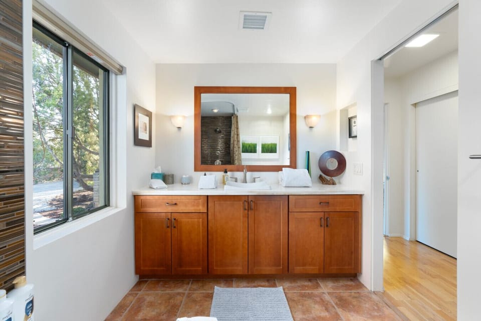 Step into comfort with a spacious and modern bathroom.