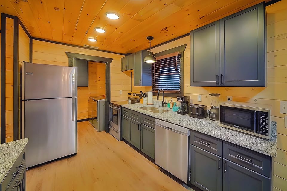 Modern kitchen fully stocked for your stay