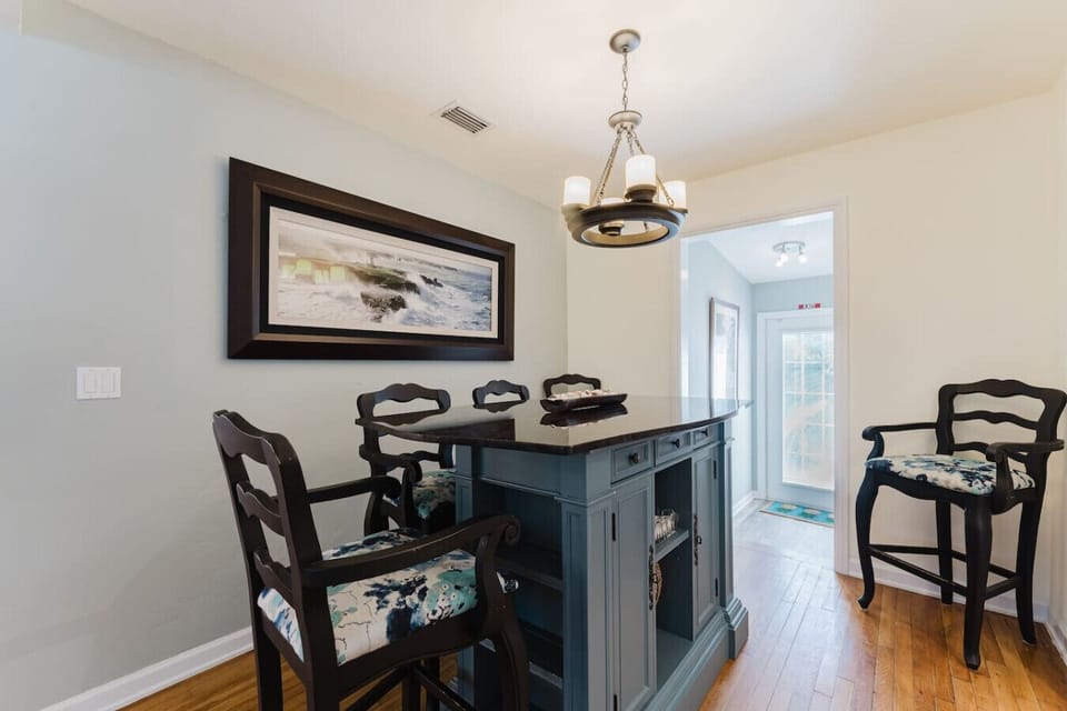Enjoy a casual meal or morning coffee in this cozy breakfast area, featuring stylish seating and elegant decor for a perfect start to your day.
