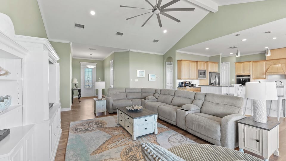 Our open concept design means everyone stays connected while enjoying breathtaking beach views from every angle.