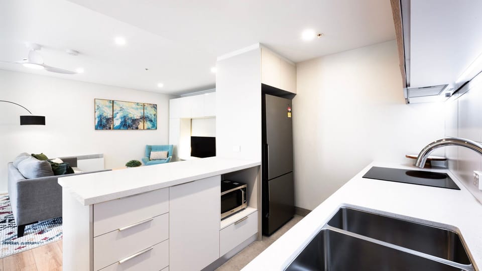 Open kitchen and living layout with seamless flow and bright interiors
