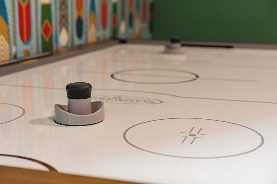air hockey located in the bunk room