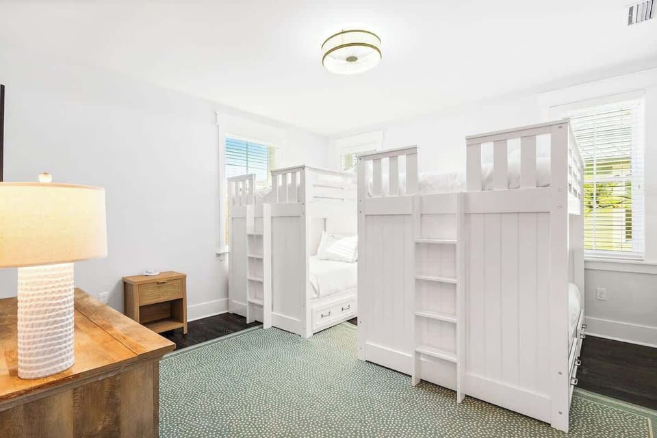 Bedroom #3 features (2) full over full bunks and a smart tv.