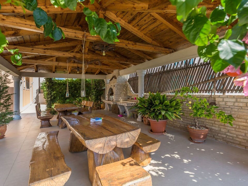 Wood, Furniture, Outdoor Furniture, Shade, Chair, Flowerpot, Outdoor Table, Resort, Outdoor Structure, Wood Stain