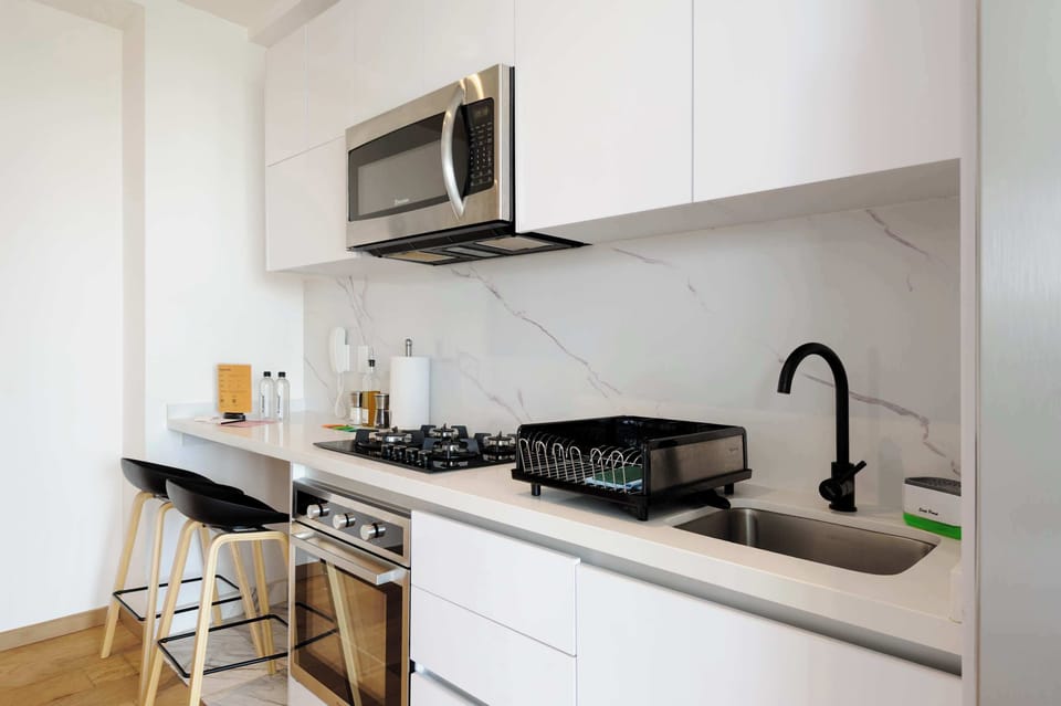Functional kitchen layout with modern finishes and practical cooking space.
