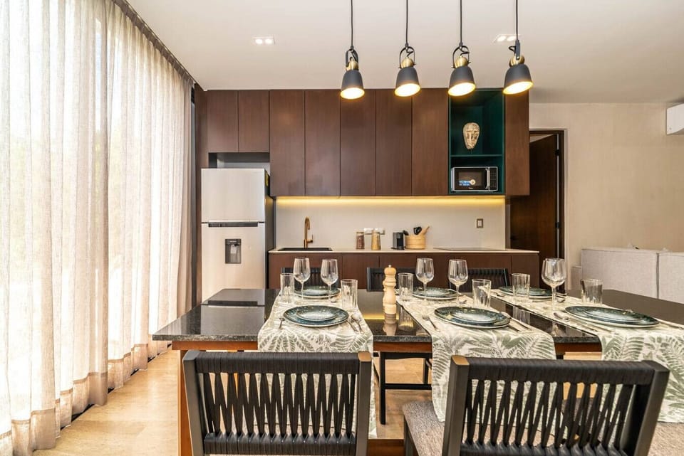 Cook, dine, and relax in this bright and inviting kitchen and dining space