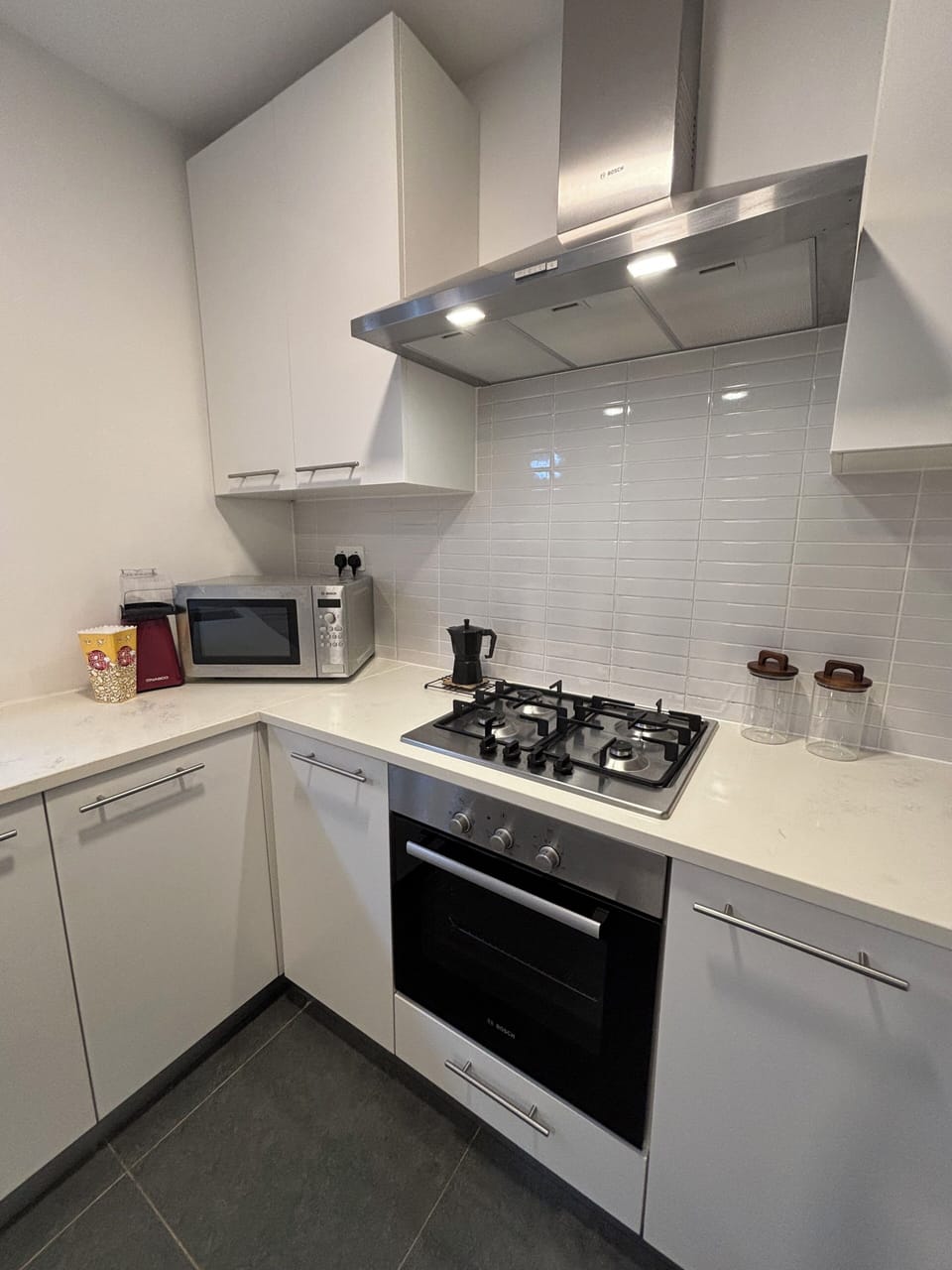 Modern fully fitted kitchen including coffee machine, popcorn maker, microwave +