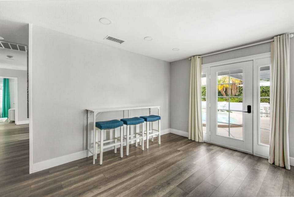 Step out from the breakfast nook directly to the pool area