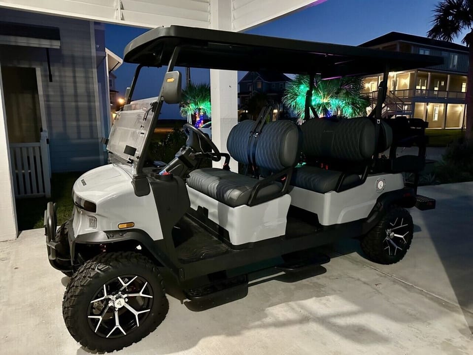 A 6-seater golf cart to cruise the neighborhood is included