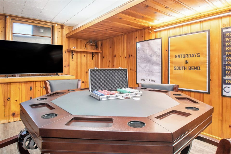 Poker chips on the poker table and TV