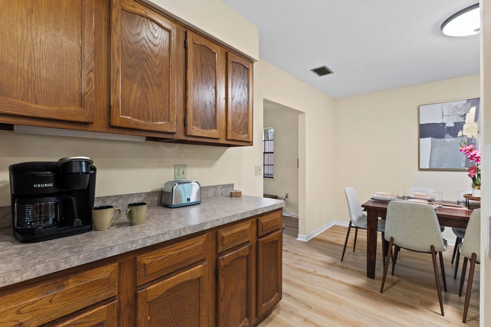Full bathroom: espresso vanity, granite countertop & walk-in tile shower