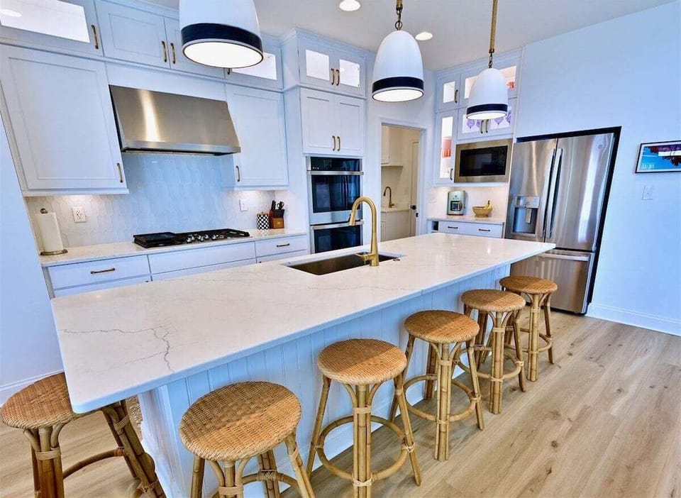 Chef Inspired Kitchen: Quartz countertops, premium cabinetry, and high-end appliances make meal prep a breeze.