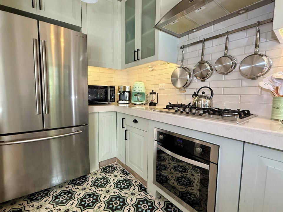 Full size French-door refrigerator, microwave, pots, pans baking ware and more.