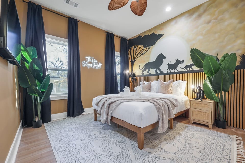 "Step into the enchanting Lion King bedroom. From the hand-painted mural to the cozy bed with plush linens, this space brings the African savanna to life. #LionKingInspired #DisneyGetaway #ThemedVacation #LuxuryTravel"