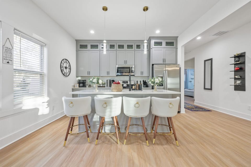 Modern Kitchen with a Fairytale Twist "Fully stocked and Snow White-inspired, this sleek kitchen combines charm and practicality for your stay. #DreamKitchen #ThemedHomes #LuxuryRetreat"