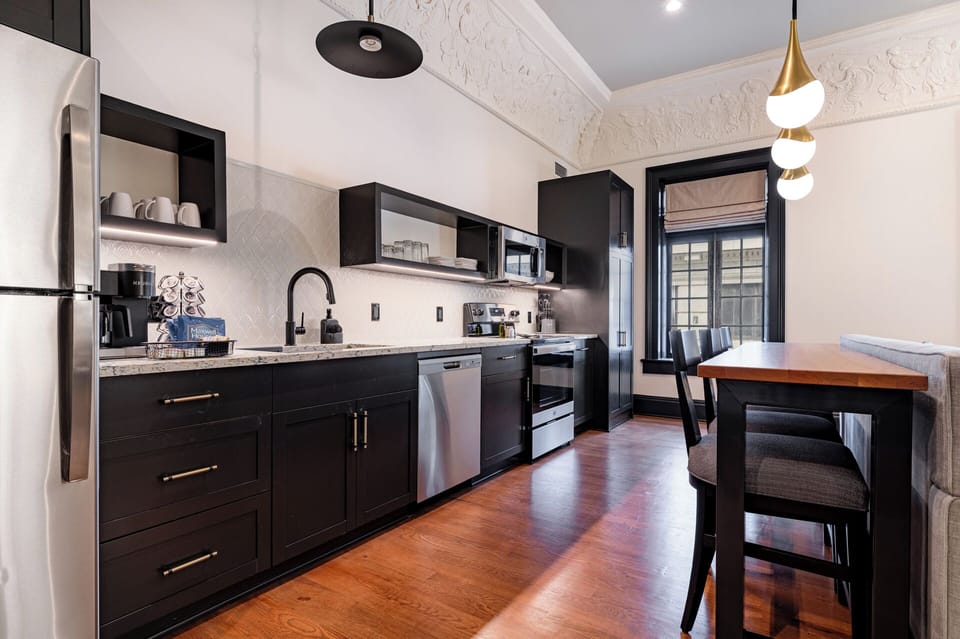 Fully equipped kitchen with modern appliances, offering everything you need for preparing meals or enjoying a morning coffee.