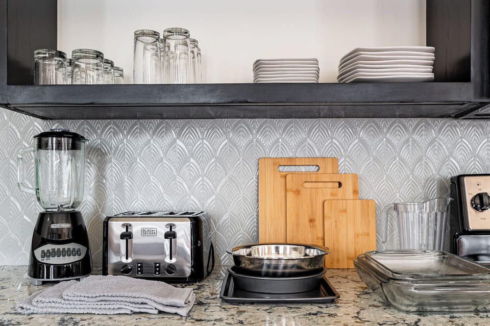 Kitchen essentials stocked in every suite.
