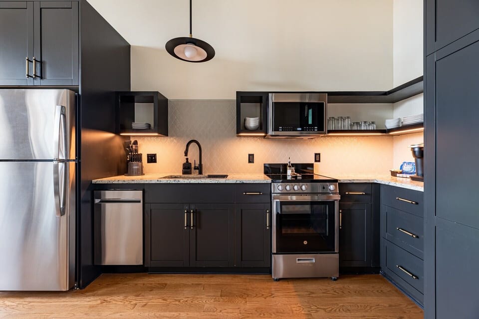 Fully equipped kitchen with modern appliances, offering everything you need for preparing meals or enjoying a morning coffee.