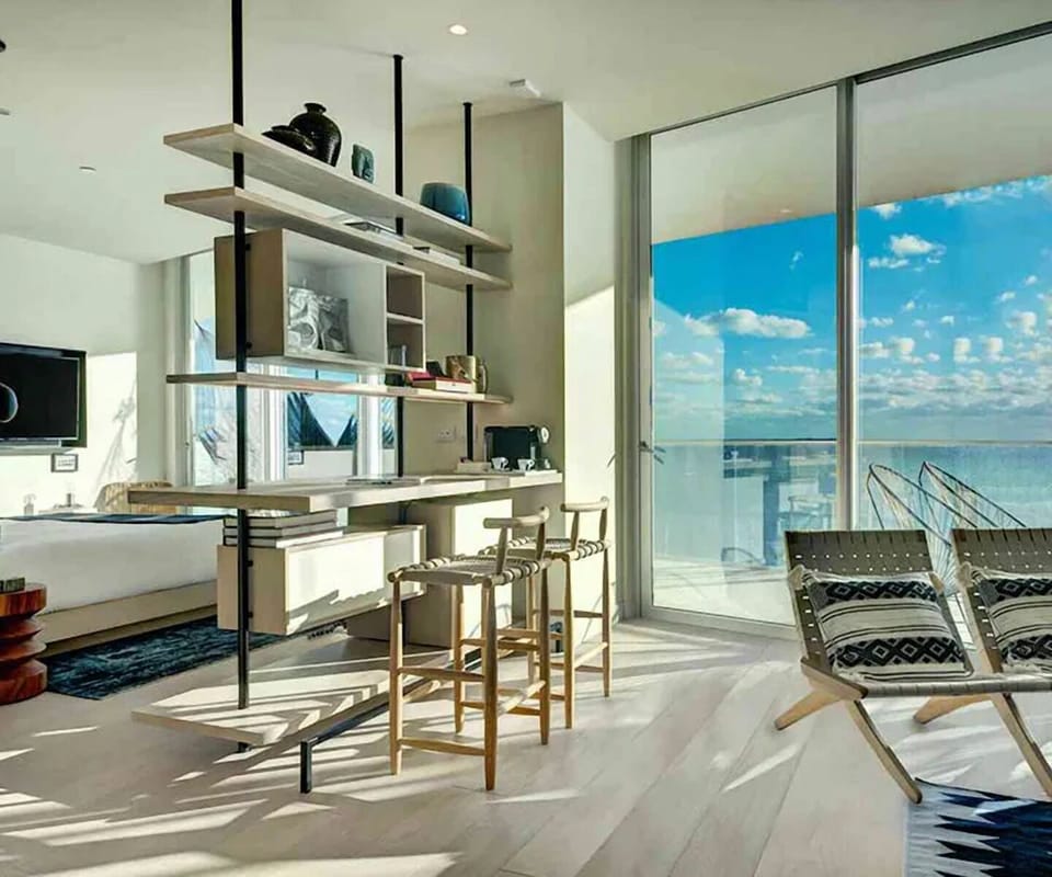Gather by sunlit windows and savor expansive sea panoramas.
