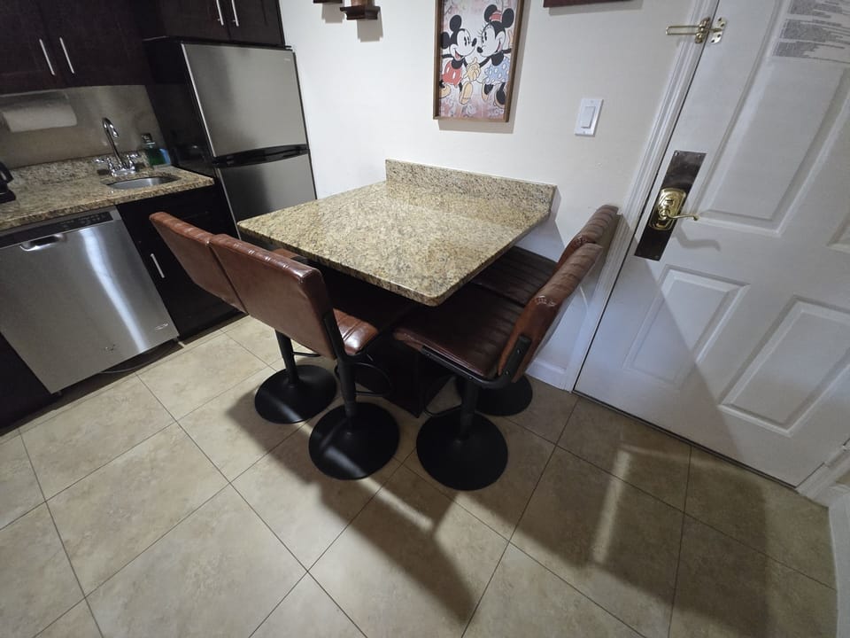 Bright and welcoming table for four—perfect for meals or game nights.