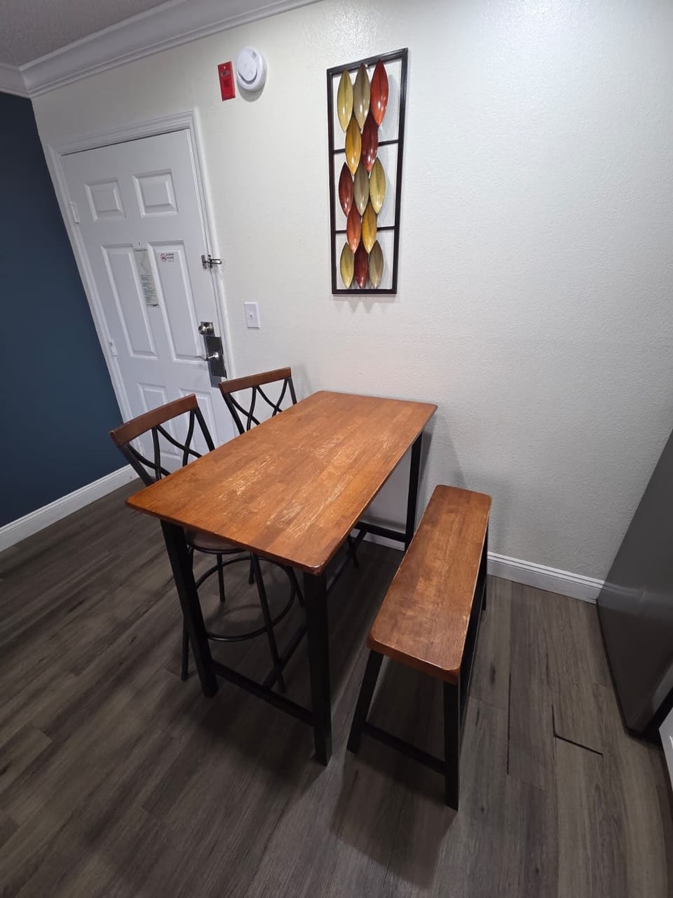 Bright and welcoming table for four—perfect for meals or game nights.