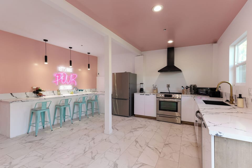 Entertain guests with flair in this sleek bar area.