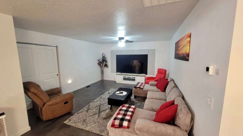 Comfortable open living with TV and Fireplace.