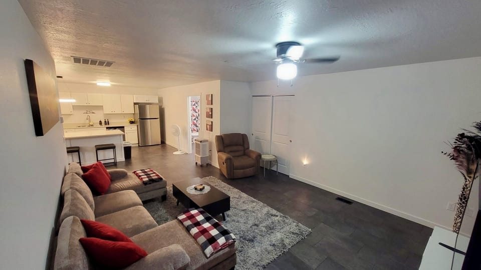 Comfortable open living with TV and Fireplace.