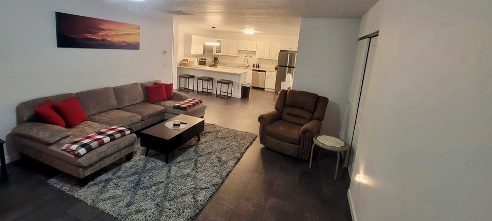 Comfortable open living with TV and Fireplace.