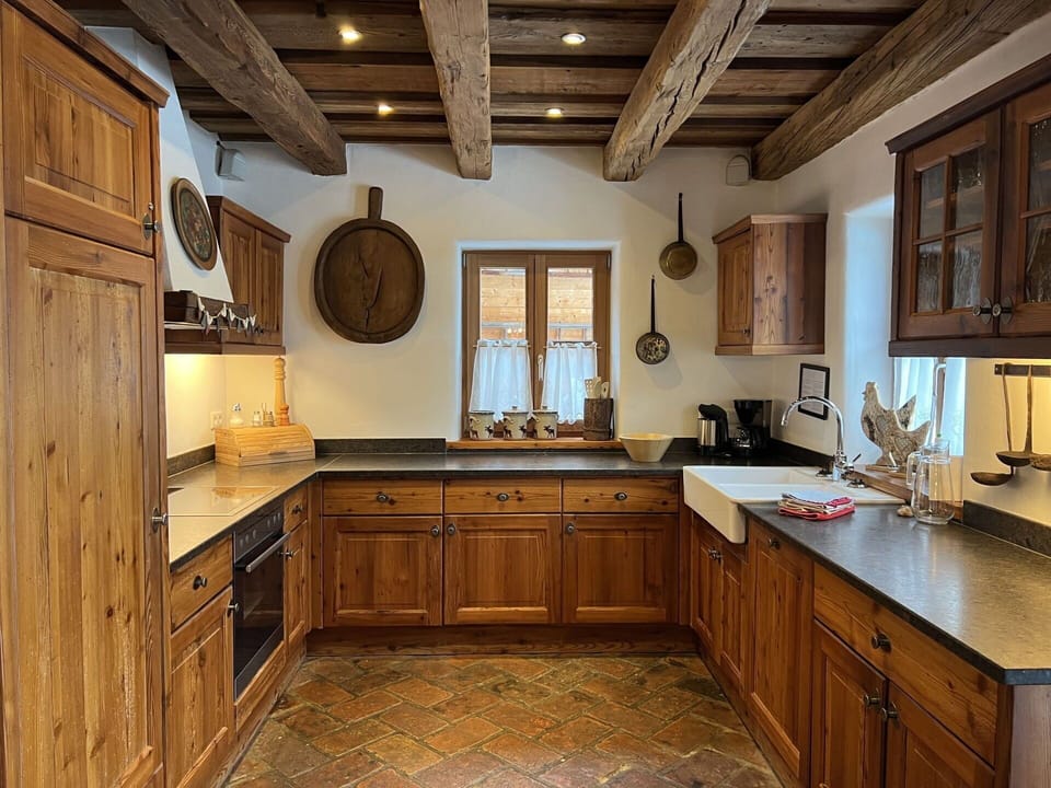 Furniture, Kitchen, Cabinetry, Flooring, Wood, Countertop, Interior Design, Drawer, Floor, Cupboard