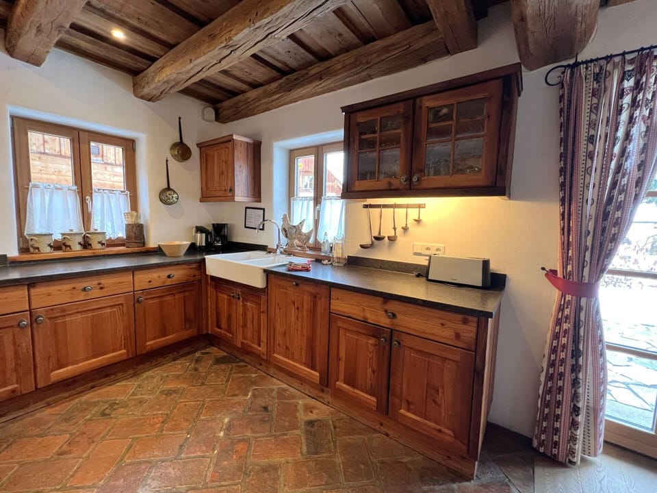 Furniture, Cabinetry, Kitchen, Interior Design, Countertop, Flooring, Wood, Drawer, Floor, Kitchen Appliance