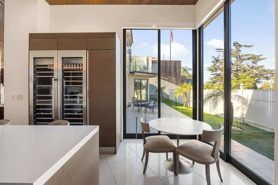 Kitchen: Built-In Wine Refrigerator, Breakfast Nook & Garden Access