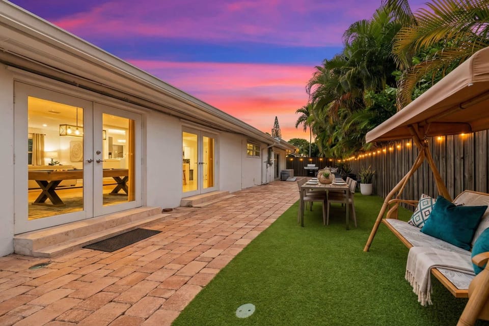  Enjoy vibrant sunsets in this lush backyard with dining and lounging spaces!